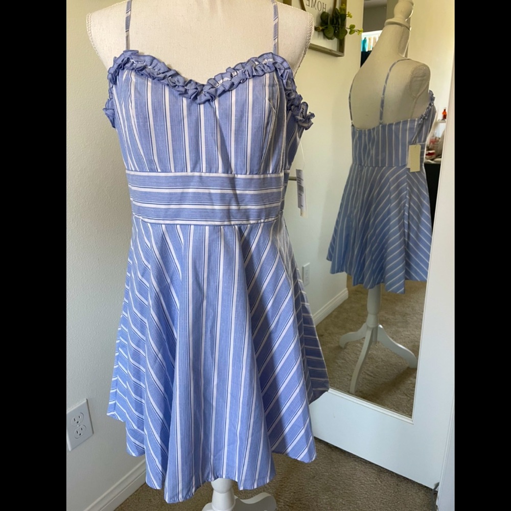 Blue/white striped minidress with ruffle neckline